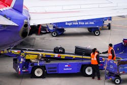 Baggage handlers unload a Southwest Airlines flight at Dallas Love Field on Jan. 7.