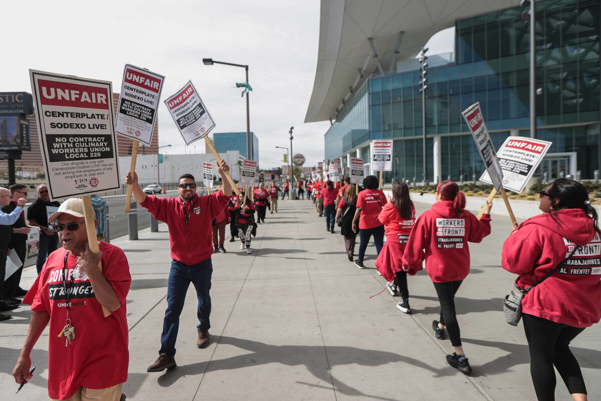 Culinary union members join a picket led by the Transport Workers Union Local 556, the union of Southwest Airlines flight attendants, at the Las Vegas Convention Center West Hall ahead of a Southwest Airlines employee event on Tuesday, Feb. 21, 2023.