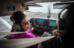 Learn 2 Fly CT student Sophie Belanger left, talks with her flight instructor Arianna Strand as they taxi around the runway last week in a Cessna 172 Skyhawk at Hartford-Brainard Airport.