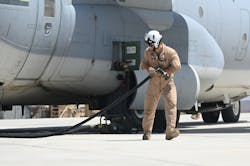 A U.S. Marine Corps KC-130J Super Hercules crew member prepares to conduct a refueling operation in support of a simulated Forward Arming and Refueling Point exercise at Chabelley Airfield, Djibouti, Feb. 22, 2023. The FARP mission enables aircraft supporting combat operations to refuel much closer to their area of operation, saving a significant amount of time. A U.S. Marine Corps KC-130J Super Hercules crew member prepares to conduct a refueling operation in support of a simulated Forward Arming and Refueling Point exercise at Chabelley Airfield, Djibouti, Feb. 22, 2023. The FARP mission enables aircraft supporting combat operations to refuel much closer to their area of operation, saving a significant amount of time.