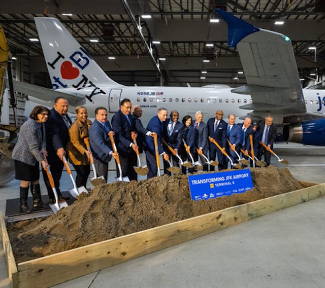 New York Governor Kathy Hochul (seventh from right) and JetBlue CEO Robin Hayes (first right) join leaders for the JFK Terminal 6 groundbreaking.
