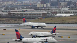 Delta Airlines planes taxi at LaGuardia airport in New York on Jan. 11, 2023. On Wednesday, Delta launched free WiFi on 75% of its domestic mainline aircraft.
