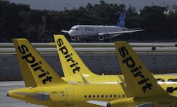 A JetBlue airliner takes off past Spirit Airlines planes at Fort Lauderdale-Hollywood International Airport. JetBlue is waging major campaign to win federal approval for its proposed Spirit buyout, which is opposed by some who claim it will diminish competition. A JetBlue airliner takes off past Spirit Airlines planes at Fort Lauderdale-Hollywood International Airport. JetBlue is waging major campaign to win federal approval for its proposed Spirit buyout, which is opposed by some who claim it will diminish competition.