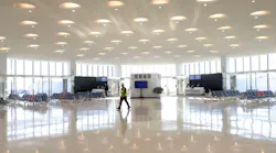 Dan Buchman walks through the newly expanded Terminal 5 at O'Hare International Airport on Jan. 31, 2023. The expansion includes 350,000 square feet of vaulted ceilings, natural light, and floor-to-ceiling high-performance glass offering an expansive view of the airfield.