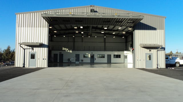 Home of two Bell 407 helicopters, the 5,500-square-foot hangar has a 65-foot by 70-foot main floor, epoxy-coated over an 8-inch slab on concrete with embedded grounding pins to dissipate any static buildup generated by the helicopter.