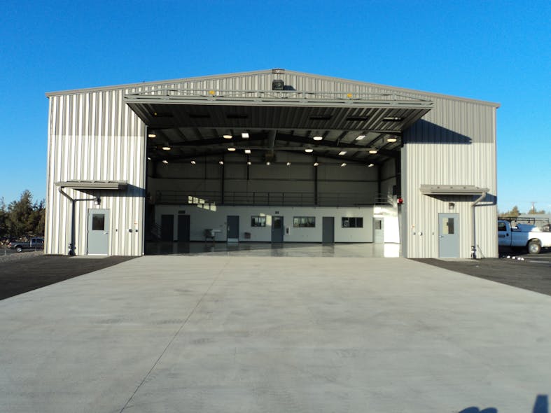 Home of two Bell 407 helicopters, the 5,500-square-foot hangar has a 65-foot by 70-foot main floor, epoxy-coated over an 8-inch slab on concrete with embedded grounding pins to dissipate any static buildup generated by the helicopter.