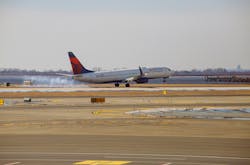 A Delta Airlines plane leaving John F. Kennedy Airport aborted its takeoff when an American Airlines jet crossed the runway in front of it. A Delta Airlines plane leaving John F. Kennedy Airport aborted its takeoff when an American Airlines jet crossed the runway in front of it.