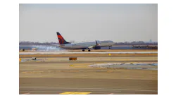 A Delta Airlines plane leaving John F. Kennedy Airport aborted its takeoff when an American Airlines jet crossed the runway in front of it.