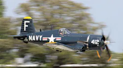 A Corsair in flight during EAA AirVenture Oshkosh 2021.