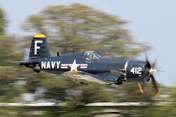 A Corsair in flight during EAA AirVenture Oshkosh 2021. A Corsair in flight during EAA AirVenture Oshkosh 2021.
