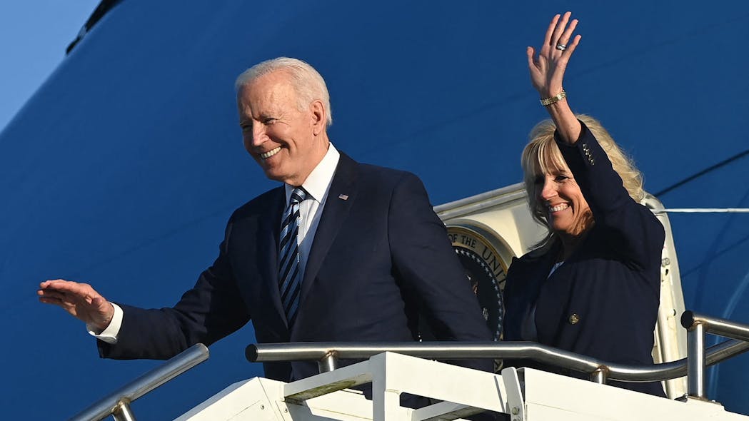 U.S. President Joe Biden, left, and first lady Jill Biden disembark from Air Force One on their arrival at Royal Air Force Mildenhall, England on Wednesday, June 9, 2021, ahead of the three-day G7 Summit. Air Force One is getting a paint job, and it resembles the iconic appearance of old.