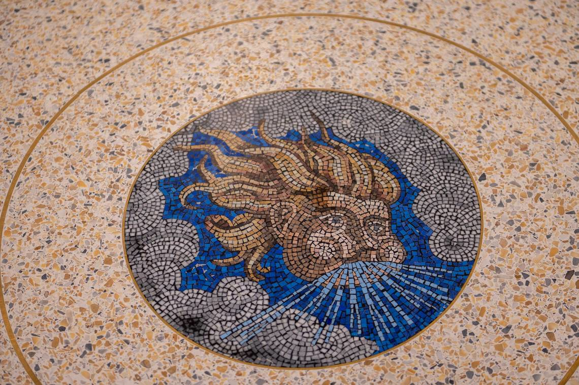 A mosaic is displayed on floor at Kansas City International Airport on Tuesday, Feb. 14, 2023. The mosaic was harvested from parts of the old terminal floor at Kansas City International Airport.