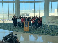 U.S. Rep. Darren Soto announced Monday $69 million in infrastructure funding for Orlando's airport. Some of the money would pay for connecting the train station, where Soto and various airport workers appeared for the announcement, with Terminal C in the background via an elevated pedestrian bridge. U.S. Rep. Darren Soto announced Monday $69 million in infrastructure funding for Orlando's airport. Some of the money would pay for connecting the train station, where Soto and various airport workers appeared for the announcement, with Terminal C in the background via an elevated pedestrian bridge.