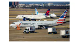 American Airlines, Delta Airline and Frontier Airlines aircraft are seen on the ramp and taxiways at DFW Airport on Sunday, March 13, 2022.
