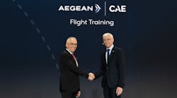 AEGEAN&rsquo;s CEO Dimitrios Gerogiannis and CAE&rsquo;s Group President, Civil Aviation, Nick Leontidis shake hands at an event to announce a joint venture between AEGEAN and CAE to open a new training center in Athens, Greece.