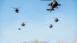 AH-64 Apaches perform a flyover at the Boeing Mesa site in Arizona.