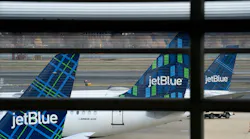JetBlue planes sit at Ronald Reagan Washington National Airport in Arlington, Virginia, on Jan. 18, 2022.