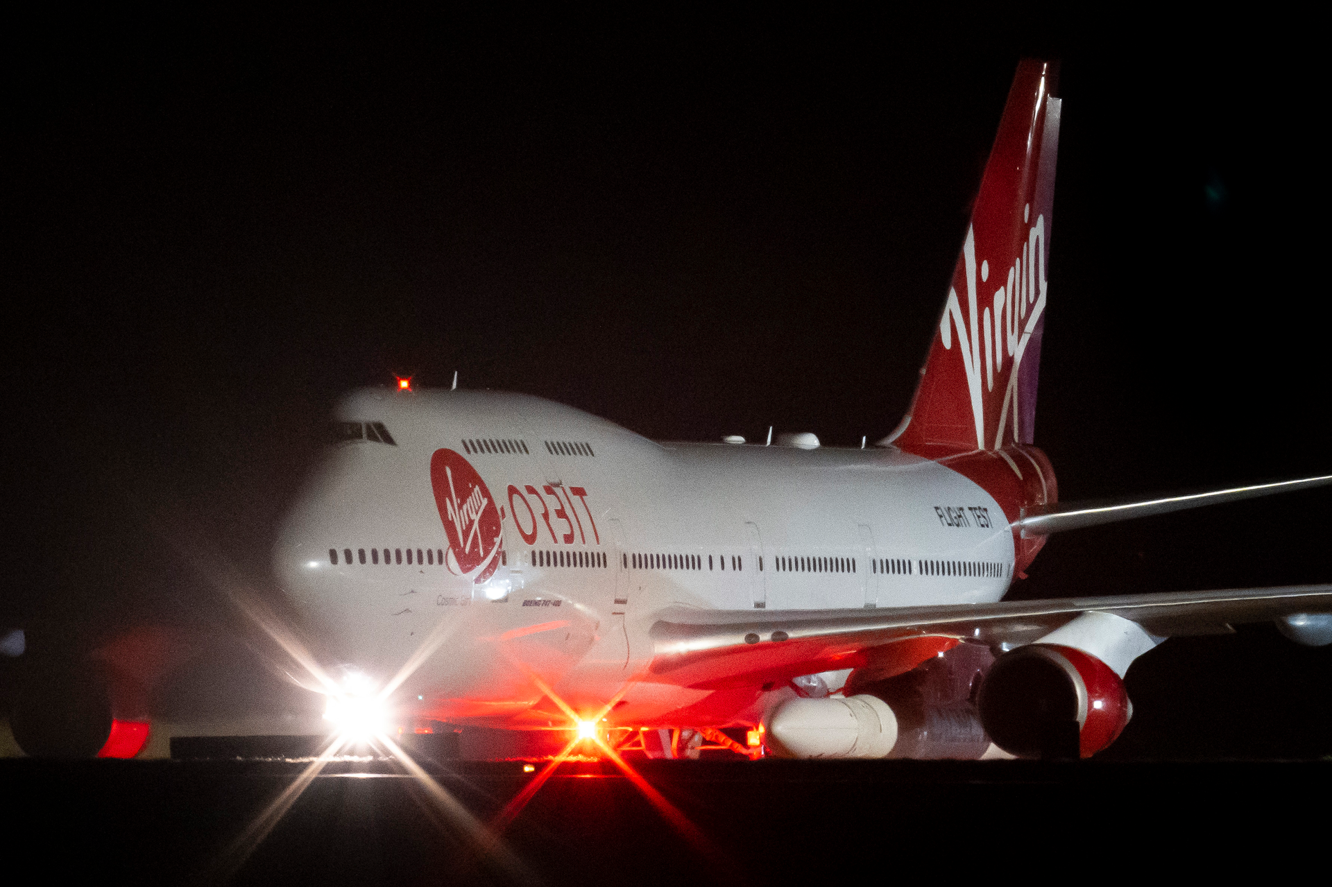 Cosmic Girl, a repurposed Boeing 747 aircraft carrying the LauncherOne rocket under its left wing, as final preparations are made at Cornwall Airport Newquay on Jan. 9, 2023, in Newquay, United Kingdom.