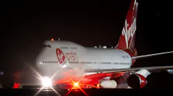 Cosmic Girl, a repurposed Boeing 747 aircraft carrying the LauncherOne rocket under its left wing, as final preparations are made at Cornwall Airport Newquay on Jan. 9, 2023, in Newquay, United Kingdom.