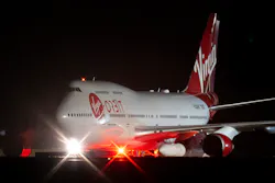 Cosmic Girl, a repurposed Boeing 747 aircraft carrying the LauncherOne rocket under its left wing, as final preparations are made at Cornwall Airport Newquay on Jan. 9, 2023, in Newquay, United Kingdom. Cosmic Girl, a repurposed Boeing 747 aircraft carrying the LauncherOne rocket under its left wing, as final preparations are made at Cornwall Airport Newquay on Jan. 9, 2023, in Newquay, United Kingdom.