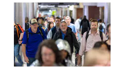 People walk through the Hartsfield-Jackson Atlanta International Airport on Monday, March 27, 2023.