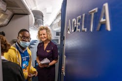 Participants walk onto a Delta Airlines jet during A Wings For All event at the Hartsfield-Jackson Atlanta International Airport Thursday, Apr. 11, 2023 Participants walk onto a Delta Airlines jet during A Wings For All event at the Hartsfield-Jackson Atlanta International Airport Thursday, Apr. 11, 2023