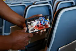 Shaun Brown, who works as an interior mechanic, shows a picture of a photograph he found at Tampa International Airport’s Airborne Maintenance and Engineering Services North Hangar on Tuesday. Shaun Brown, who works as an interior mechanic, shows a picture of a photograph he found at Tampa International Airport’s Airborne Maintenance and Engineering Services North Hangar on Tuesday.