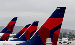 Delta Air Lines posted a record $12.8 billion in revenue in the first quarter of the year, as demand for air travel soared and travelers paid more for flights and premium seats.