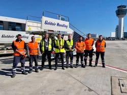 Michalis Panagoulias (center) began as a delivery boy at Goldair Handling before earning several promotions, including his current position as corporate health and safety manager. Michalis Panagoulias (center) began as a delivery boy at Goldair Handling before earning several promotions, including his current position as corporate health and safety manager.