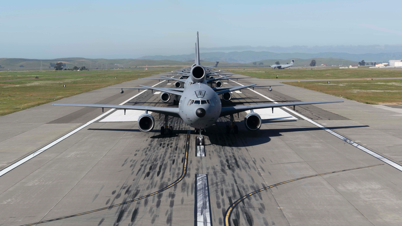 A formation of 21 aircraft taxi on the flightline as part of a maximum aircraft generation event for exercise Golden Phoenix at Travis Air Force Base, Calif., May 12, 2023. During the exercise, the Department of the Air Force-Massachusetts Institute of Technology Artificial Intelligence Accelerator MagNav project performed real-time magnetic navigation on the C-17A Globemaster III in flight, becoming the first organization to successfully demonstrate the cutting-edge technology in real-time on a Defense Department aircraft.