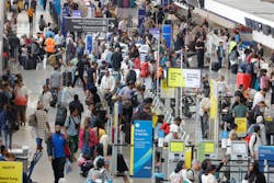 Travelers walk through Terminal North of Hartsfield-Jackson International Airport in Atlanta on Tuesday, May 9, 2023. Travelers walk through Terminal North of Hartsfield-Jackson International Airport in Atlanta on Tuesday, May 9, 2023.