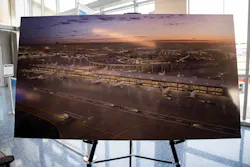 A rendering of the planned Terminal F during a press conference at Terminal C in DFW International Airport on Tuesday, May 16, 2023. DFW International Airport and American Airlines have come to a deal for $4.8 billion in expansions, including $1.6 billion for the new terminal that would include 15 new gates. A rendering of the planned Terminal F during a press conference at Terminal C in DFW International Airport on Tuesday, May 16, 2023. DFW International Airport and American Airlines have come to a deal for $4.8 billion in expansions, including $1.6 billion for the new terminal that would include 15 new gates.