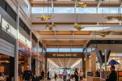Travelers are greeted by sculptures called Jazz Birds, by artist Willie Cole, at Kansas City International Airport on Tuesday, Feb. 28, 2023. Travelers are greeted by sculptures called Jazz Birds, by artist Willie Cole, at Kansas City International Airport on Tuesday, Feb. 28, 2023.