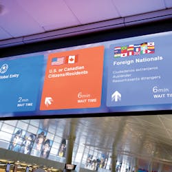DFW&apos;s multilingual wayfinding signs display English and up to three other languages at one time.