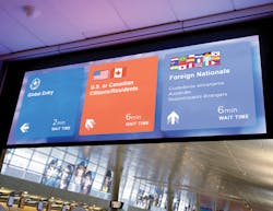 DFW&apos;s multilingual wayfinding signs display English and up to three other languages at one time.