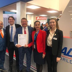 Zheni Chaneva, Project Manager Lithium Batteries Certification, IATA, presenting the CEIV Lithium Batteries Certificate to Chris Alf, Chairman, National Air Cargo Holdings, Inc. at National Airlines exhibition booth during the Air Cargo Europe event.