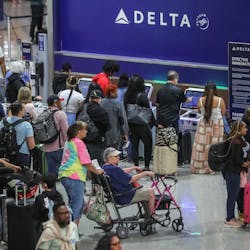 May 25, 2023 Hartsfield-Jackson International Airport: Here travelers surge at the South Terminal inside the airport Thursday morning, May 25, 2023 where Large crowds are expected to pass through Hartsfield-Jackson International Airport throughout the Memorial Day weekend.