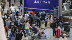May 25, 2023 Hartsfield-Jackson International Airport: Here travelers surge at the South Terminal inside the airport Thursday morning, May 25, 2023 where Large crowds are expected to pass through Hartsfield-Jackson International Airport throughout the Memorial Day weekend.
