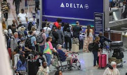 May 25, 2023 Hartsfield-Jackson International Airport: Here travelers surge at the South Terminal inside the airport Thursday morning, May 25, 2023 where Large crowds are expected to pass through Hartsfield-Jackson International Airport throughout the Memorial Day weekend.