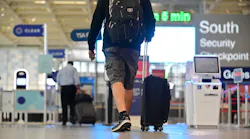 A travelers heads toward security at Minneapolis-St. Paul International Airport on Sept. 17, 2020. A pilot program called MSP Reserve lets travelers who are flying out of Terminal 2 choose the time they wish to pass through security an 'jump' the often-long lines.
