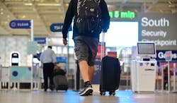A travelers heads toward security at Minneapolis-St. Paul International Airport on Sept. 17, 2020. A pilot program called MSP Reserve lets travelers who are flying out of Terminal 2 choose the time they wish to pass through security an &apos;jump&apos; the often-long lines.