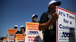 Aircraft Mechanics Fraternal Association Local 11, Southwest Airlines flight Attendants' Union and Southwest Airlines Pilots' Association picket for contract negotiations at the entrance to Love Field in Dallas Friday July 22, 2016. Airline labor relations are governed by the Railway Labor Act. Aircraft Mechanics Fraternal Association Local 11, Southwest Airlines flight Attendants' Union and Southwest Airlines Pilots' Association picket for contract negotiations at the entrance to Love Field in Dallas Friday July 22, 2016. Airline labor relations are governed by the Railway Labor Act.