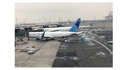 Two United Airlines jets are seen at Newark Airport&apos;s Terminal B. The airline will be the first to equip it&apos;s entire mainline fleet with Braille seat markers and other signs to help passengers.