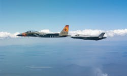 U.S. Air Force F-35A Lightning II assigned to Luke Air Force Base, Arizona, flies off the wing of an F-15C U.S. Air Force F-35A Lightning II assigned to Luke Air Force Base, Arizona, flies off the wing of an F-15C