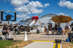 World War II ace Bud Anderson (seated second from left) discusses his wartime flight experiences. World War II ace Bud Anderson (seated second from left) discusses his wartime flight experiences.