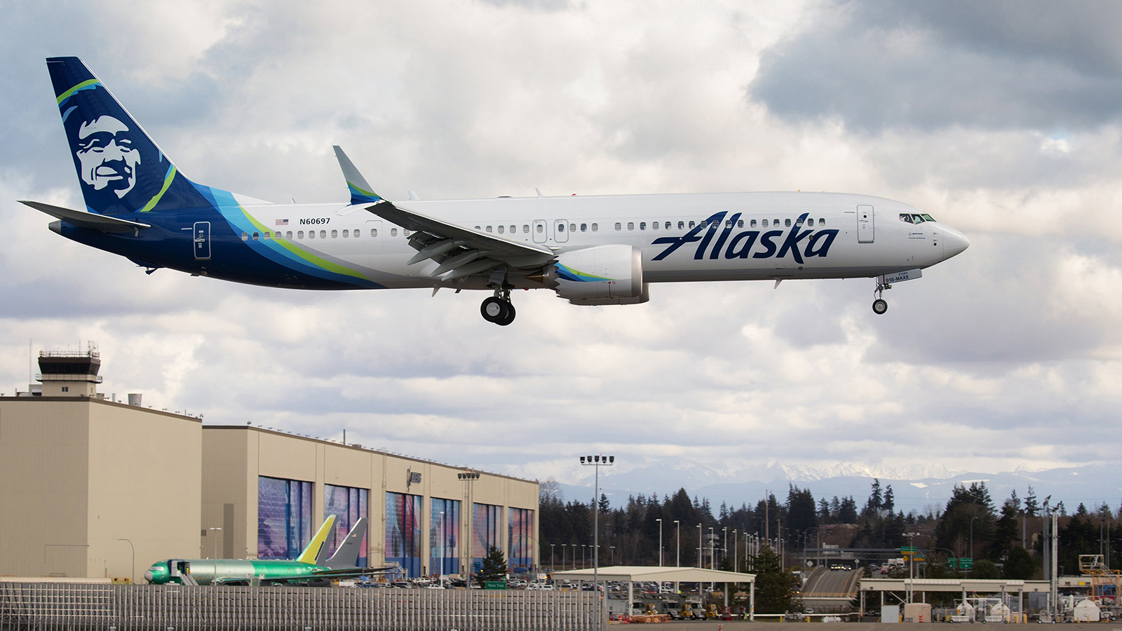 A Boeing 737 MAX-9, built for Alaska Airlines, undergoes testing as it flies past the Boeing factory in Everett Washington on March 23, 2020.