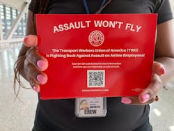 A card handed out to passengers at Newark Liberty Airport on Tuesday provides information about efforts to stop abuse and assault on flight crews, which includes a federal legislation to ground violent offenders. A card handed out to passengers at Newark Liberty Airport on Tuesday provides information about efforts to stop abuse and assault on flight crews, which includes a federal legislation to ground violent offenders.