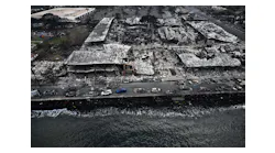 An aerial image taken on Aug. 10, 2023, shows destroyed buildings on the waterfront burned to the ground in Lahaina in the aftermath of wildfires in western Maui, Hawaii.