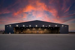 B. Coleman Aviation hangar at sunset. B. Coleman Aviation hangar at sunset.