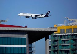 San Diego, CA - February 1: A Lufthansa jet approaches San Diego International Airport for a landing from Munich on February 1, 2023. San Diego, CA - February 1: A Lufthansa jet approaches San Diego International Airport for a landing from Munich on February 1, 2023.